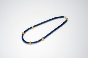 Lapiz Lazuli necklace with gold wax beads