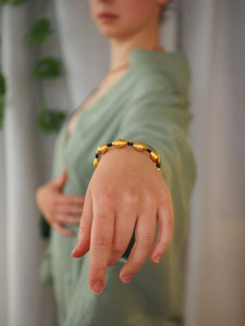 Black Sapphire and Handmade Wax Gold Bead Bracelet